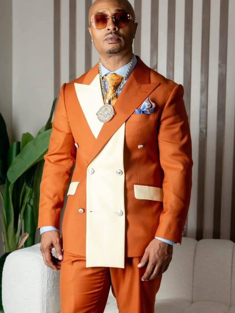 Greg wearing a custom Burnt orange and cream Sean M Horton Atelier Custom Suit. Custom Suit Kansas City